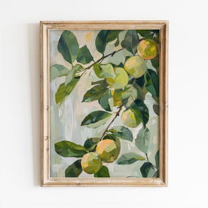 May include: A framed painting of a branch of a tree with green leaves and yellow-green apples. The background is a light blue-green color.