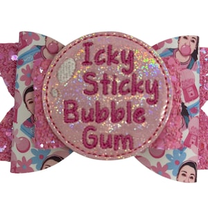 May include: Pink glitter hair bow with a pink circle in the center that says "Icky Sticky Bubble Gum".