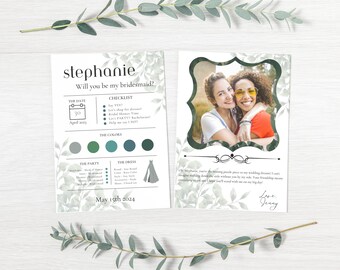 May include: A bridesmaid proposal card with a green leafy design. The card features a photo of two women smiling at the camera. The text on the card reads "Stephanie, Will you be my bridesmaid?" and includes a checklist of tasks for the bridesmaid to complete. The date of the wedding is May 15th, 2024.