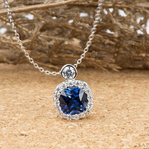 Blue Sapphire Halo Pendant in Sterling Silver, Cable Chain