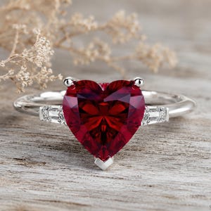 2ct Heart Ruby Ring with Baguette Moissanite Side Stones in Solid Sterling Silver
