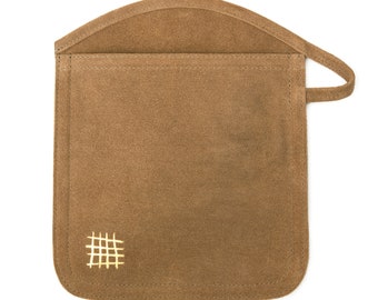 May include: A brown suede pouch with a flap top and a small stitched design on the front. The pouch has a single strap.