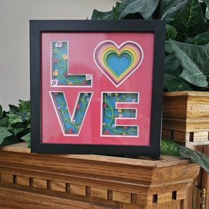 This Handmade &quot;LOVE&quot; Shadow Box Has 9 Paper Layers, In An 8 x 8 Frame, And Is Ready To Display.