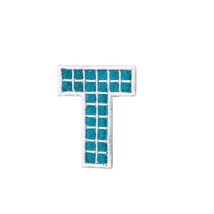 May include: Embroidered patch in the shape of the letter "T". The letter is teal with a grid pattern and a white border. The patch is likely for clothing or accessories.