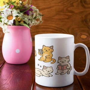 かわいい猫マグカップ | かわいい漫画猫コーヒーカップ – 猫好き、読書家、毛糸好き、そしてふわふわの友達と過ごす心地よい朝への贈り物