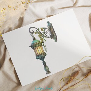 May include: A watercolor illustration of a vintage street lamp with a green and gold finish, adorned with climbing vines and flowers. The lamp is mounted on a decorative bracket. The artwork is on a white paper with the text "Evelyn's Woods".