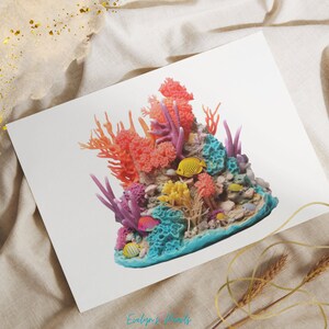 May include: A colorful coral reef scene with pink, orange, and blue coral, and yellow and orange fish. The coral reef is on a blue base with a white background.