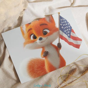 A close-up of a bright-eyed orange fox smiling while holding a mini American flag, laying on soft beige fabric for a mockup preview.