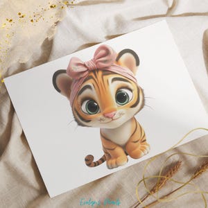 May include: A cartoon tiger cub with orange and black stripes wearing a pink headband with a floral pattern. The tiger has large green eyes and a pink nose.