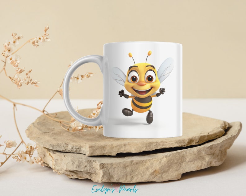 May include: White ceramic mug with a cartoon bee design. The bee is yellow and black with a smiling face and outstretched arms.