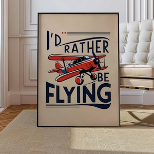 Op de afbeelding: Een vintage poster met een rood vliegtuig en de tekst "I'd rather be flying".