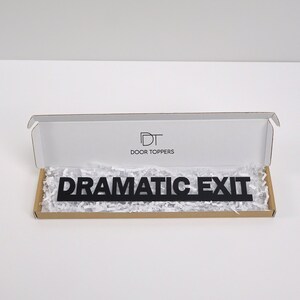 Gift packaged door topper ready to give as a leaving gift.