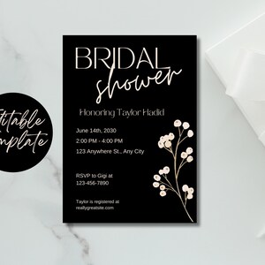 May include: Black and white bridal shower invitation with a floral design. The invitation includes the text "BRIDAL shower", "Honoring Taylor Hadid", "June 14th, 2030", "2:00 PM - 4:00 PM", "123 Anywhere St., Any City", "RSVP to Gigi at 123-456-7890", and "Taylor is registered at reallygreatsite.com".