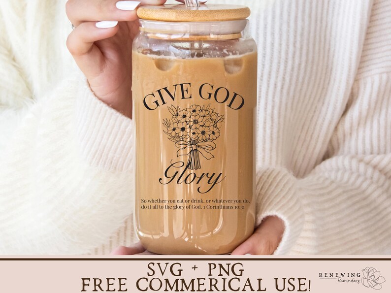 May include: A glass jar with a brown lid and a straw, filled with a brown liquid. The jar has a black and white design that says "Give God Glory" and a Bible verse.