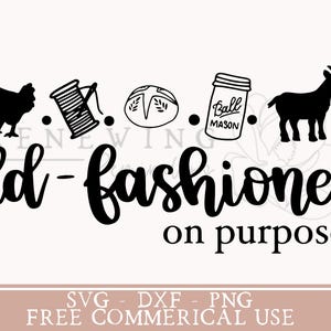 May include: Black and white graphic design with the text "Old-fashioned on purpose". The design includes a chicken, a spool of thread, a loaf of bread, a mason jar, and a goat.
