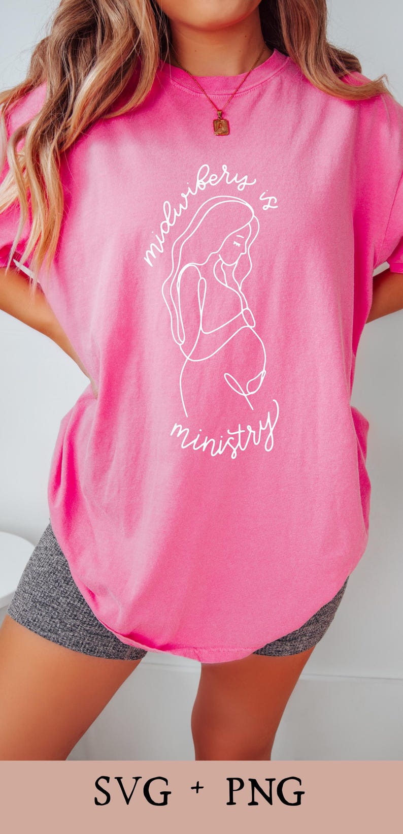 May include: A pink t-shirt with a white outline of a pregnant woman and the text "Motherhood is ministry".