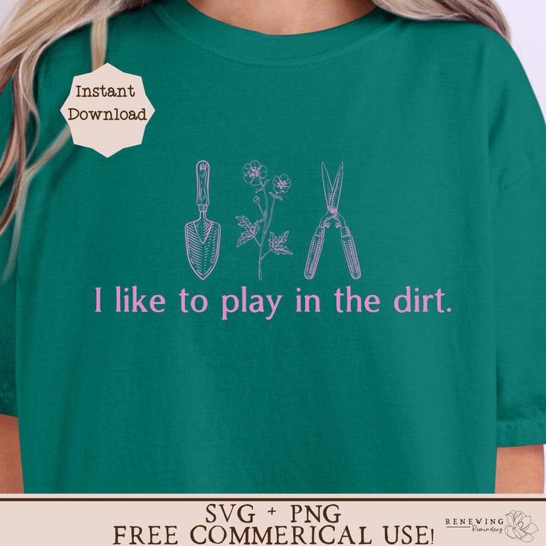 May include: A green t-shirt with the text "I like to play in the dirt." in pink. The text is surrounded by a trowel, a flower, and a pair of pruning shears, all in pink.