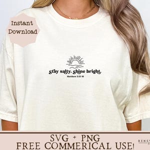 May include: Cream-colored t-shirt with the text "Stay salty. Shine bright." and a sun and wave graphic. The text "Matthew 5:13-16" is below the phrase. The shirt also has the text "Instant Download" and "SVG + PNG FREE COMMERCIAL USE!"