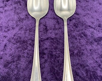 Needlepoint-Beaded Artistry  Stainless  Sugar Spoon By Oneida Silver Needlepoint Beaded Artistry Stainless Sugar Spoon