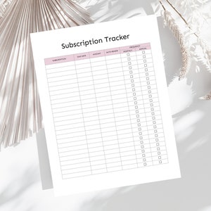 May include: A printable subscription tracker with columns for subscription name, due date, amount, auto renew, frequency, and notes. The frequency column has checkboxes for monthly and annual.