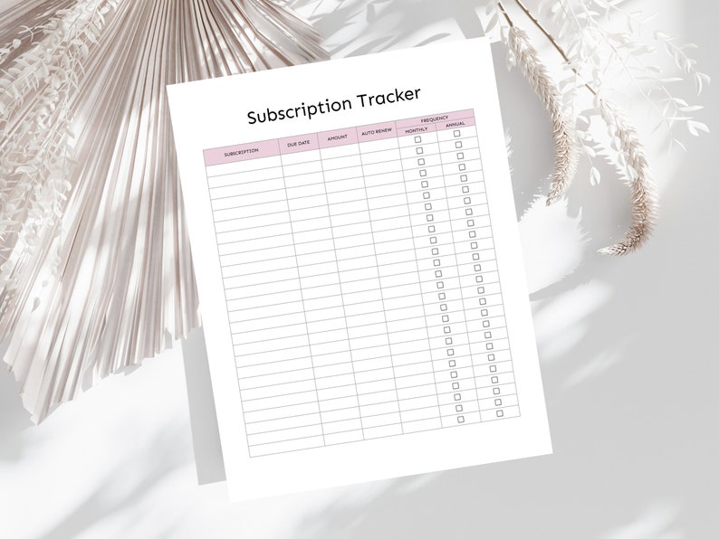 May include: A printable subscription tracker with columns for subscription name, due date, amount, auto renew, frequency, and notes. The frequency column has checkboxes for monthly and annual.
