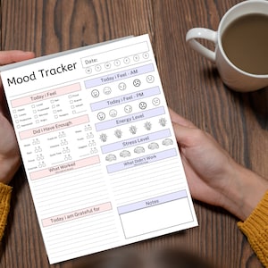 May include: A printable mood tracker with sections for daily mood, energy level, stress level, what worked, what didn't work, and a gratitude section. The tracker also includes a section for notes.