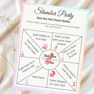 May include: A printable game board for a slumber party with the text "Slumber Party Spin the Nail Polish Bottle". The board is divided into eight sections with different nail polish activities, such as "Add Glitter to one Nail", "Paint a heart on two nails", "Add Dots to a friend nail", "Half Paint", "Paint Stripes on your nail", "Paint a Nail in one Stroke", "Paint a Nail with your eyes closed", and "Paint a Swirl on your thumb".