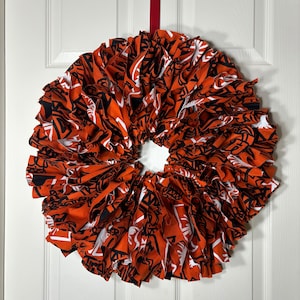 Corona de algodón naranja y negra hecha a mano - Decoración del hogar de 55 cm