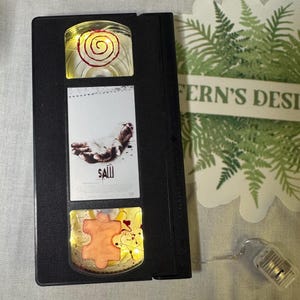 Saw VHS Light