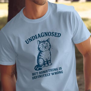 Undiagnosed but Something is Definitely Wrong Cat Funny Saying T-Shirt, Anxious Kitten Sticker, Cute Feline Mug, Pet Lover Gift Idea