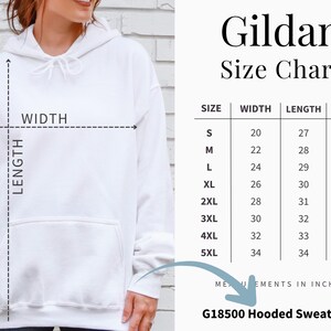 May include: A white hooded sweatshirt with a front kangaroo pocket and matching drawstring. A size chart for the G18500 model is displayed, listing sizes S through 5XL with width, length, and sleeve measurements provided in inches.