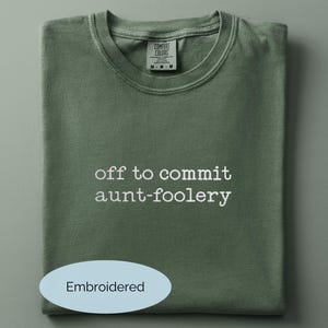 May include: A set of three ceramic mugs with a speckled, matte finish. The mugs are in shades of cream, light gray, and dark gray. Each mug has a simple, minimalist design, perfect for coffee or tea.