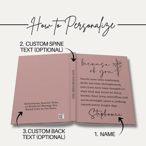 May include: Open book with a dusty rose cover, featuring the text "because of you" and a floral cross illustration. The inside pages include personalized text options for the name, spine, and back cover. The book is designed for customization.