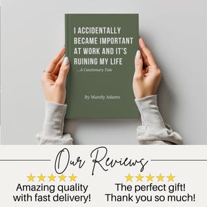 May include: A book with a solid olive green cover featuring white text that reads I ACCIDENTALLY BECAME IMPORTANT AT WORK AND IT'S RUINING MY LIFE ...A Cautionary Tale By Mandy Adams. The book is held upright against a neutral grey background.