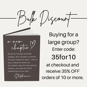 May include: A dark gray journal with the words "a new chapter" and a heart symbol. The journal has inspirational text and the name "Stephanie" at the bottom. The image also includes text about a bulk discount.