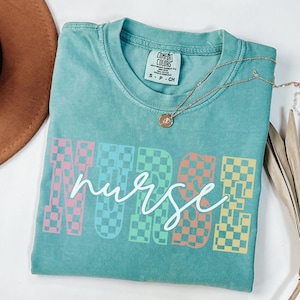 Checkered Nurse Shirt, Trendy Registered Nurse T-Shirt, Nursing Tee for Work, Comfort Colors Nurse Graduation Gift, New Nurse Appreciation