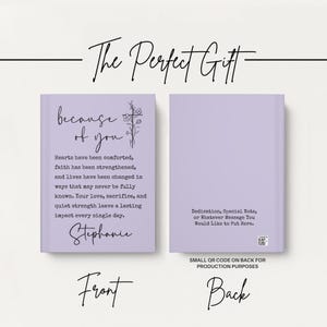 May include: A lavender journal with the text "because of you" and a floral cross design. The front cover includes a personalized message and name. The back cover has space for a dedication.