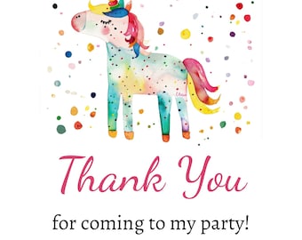 Puede incluir: Una ilustración acuarela colorida de un unicornio con una crin y cola de arcoíris. El unicornio está rodeado de confeti de colores. El texto "Thank You for coming to my party! I love my ______ Love, Lyla" está escrito debajo del unicornio.