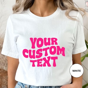 a woman wearing a t - shirt that says your custom text