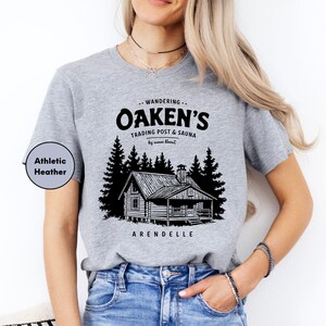 a woman wearing a t - shirt that says oaken's