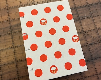 reclaimed paper daruma origami cover hand bound coptic stitch notebook 5"x3.5" 100 pages
