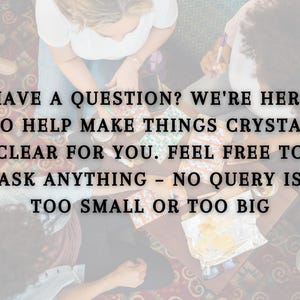 May include: A group of people gathered around a table with a message that reads "Have a question? We're here to help make things crystal clear for you. Feel free to ask anything - no query is too small or too big."