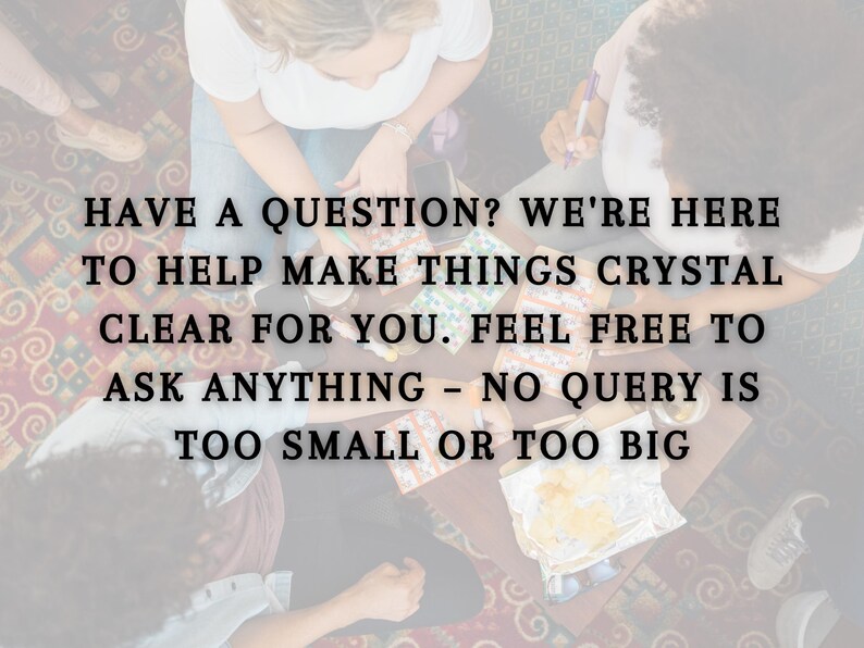May include: A group of people gathered around a table with a message that reads "Have a question? We're here to help make things crystal clear for you. Feel free to ask anything - no query is too small or too big."