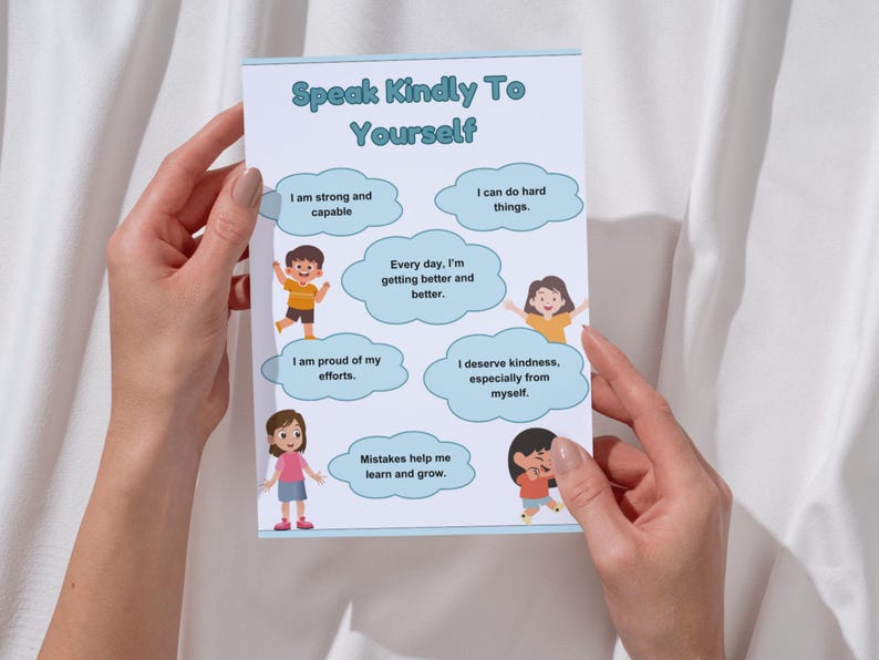 May include: A blue and white printable poster with the text "Speak Kindly To Yourself" and illustrations of children with positive affirmations. The affirmations include "I am strong and capable", "I can do hard things", "Every day, I'm getting better and better", "I am proud of my efforts", "I deserve kindness, especially from myself", and "Mistakes help me learn and grow."