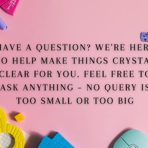 May include: A pink background with the text "HAVE A QUESTION? WE'RE HERE TO HELP MAKE THINGS CRYSTAL CLEAR FOR YOU. FEEL FREE TO ASK ANYTHING - NO QUERY IS TOO SMALL OR TOO BIG". There are various school supplies scattered around the text, including a ruler, a pencil, a mouse, and some colorful blocks.