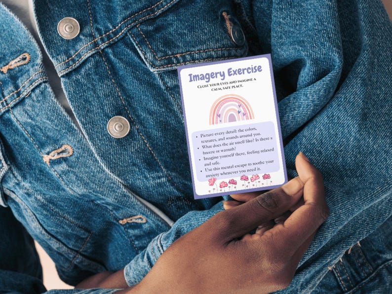 May include: A purple card with the text "Imagery Exercise" and instructions to close your eyes and imagine a calm, safe place. The card features a rainbow with pink, orange, yellow, and purple colors and a few small pink flowers.