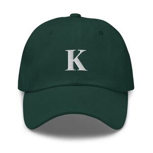Sombrero de papá con letra 'K'