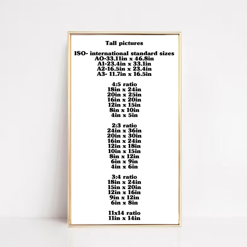May include: A white poster with black text listing different standard sizes for tall pictures in inches. The poster includes ISO standard sizes and different aspect ratios, including 4:5, 2:3, 3:4, and 11x14.