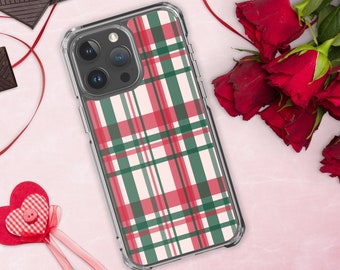 May include: A clear phone case with a red and green plaid pattern. The case is designed for an iPhone.