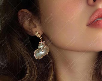Gouden schelpoorbellen: statement sieraden met strass schelp